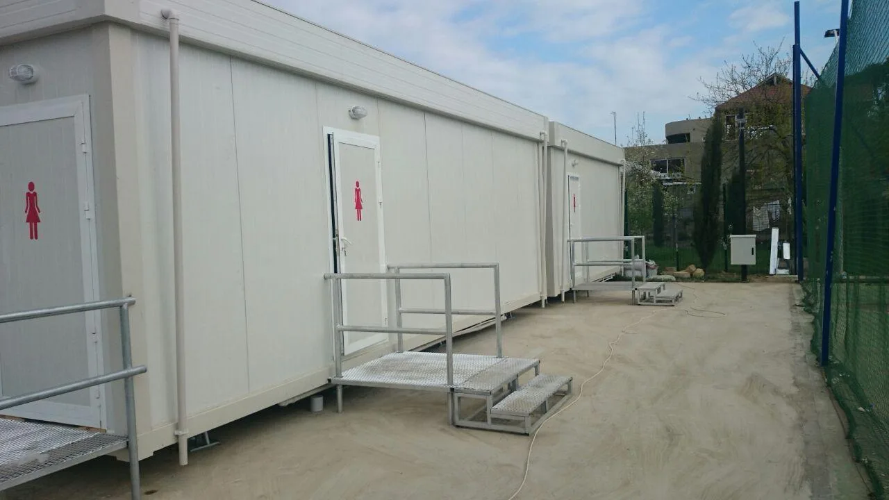 Temporary modular washrooms with male, female and accessible entrances at a competition venue